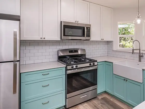 Cabinet painting in light blue and white